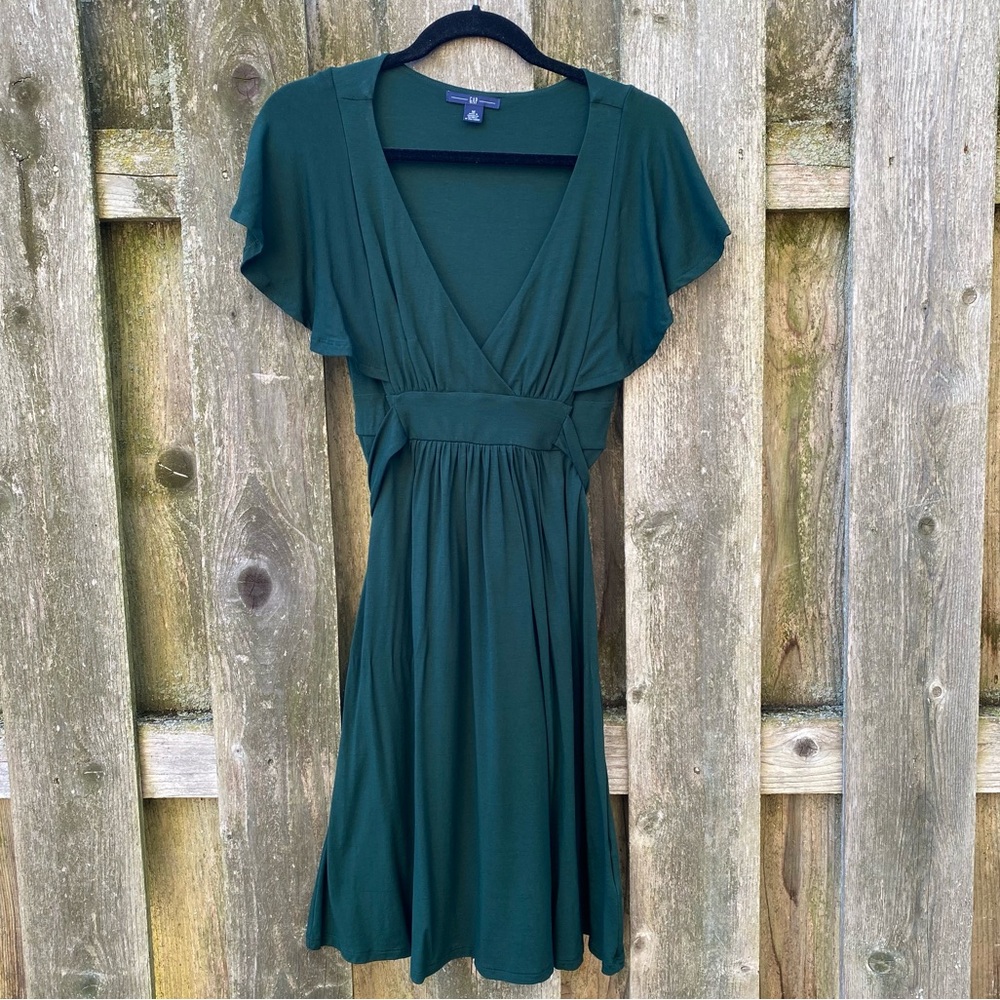 Dark green flutter sleeve tie back dress